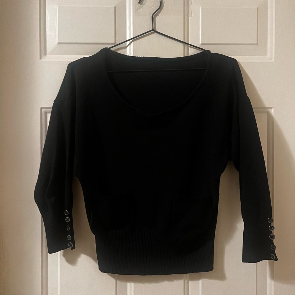 Businesss causal black sweater with scoop neckline & a cute front pocket detail